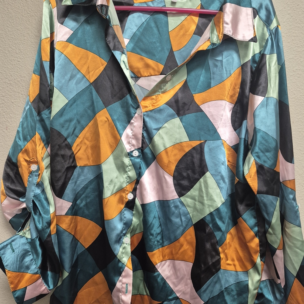 long-sleeve button-down shirt from the brand White Rhino. 